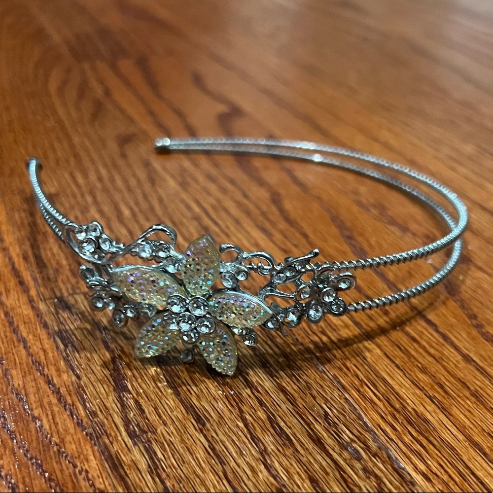 Fancy Flower Head Band in silver and rhinestones.